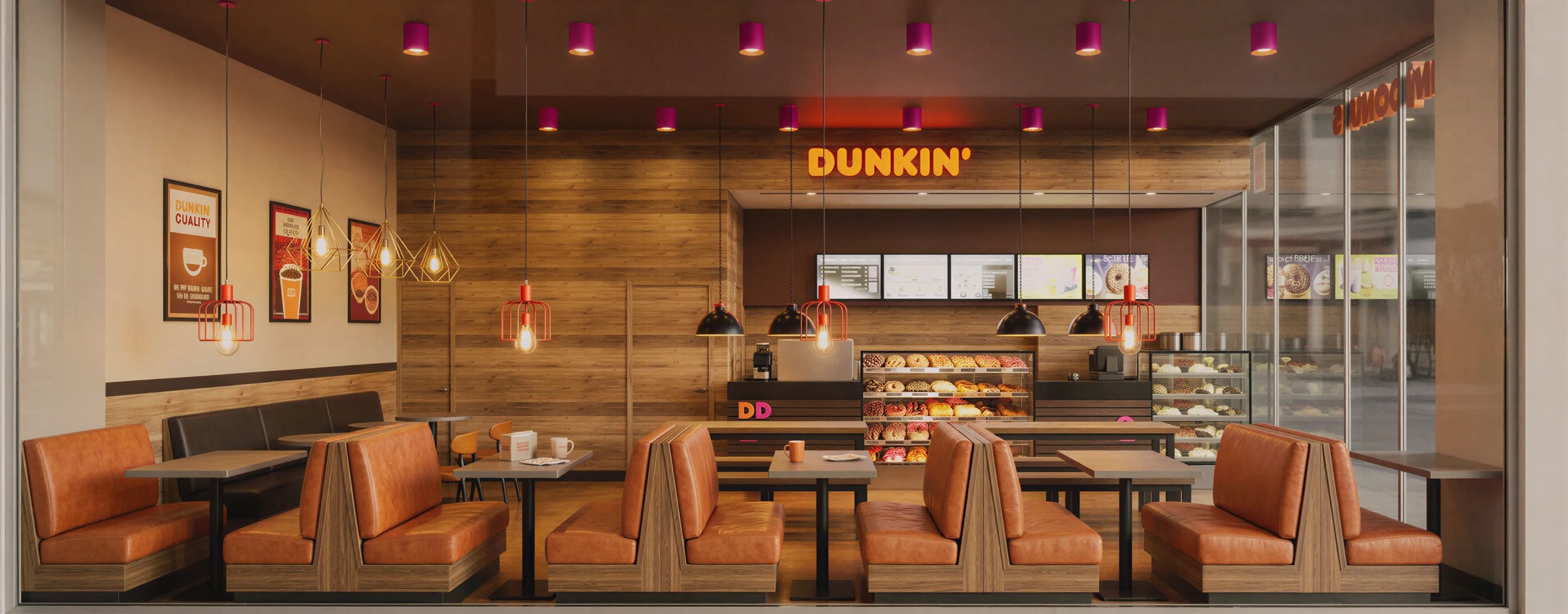 Dunkin', Colombia · Design for franchisee · Track record — restaurant interior with leather booths and pendant lights